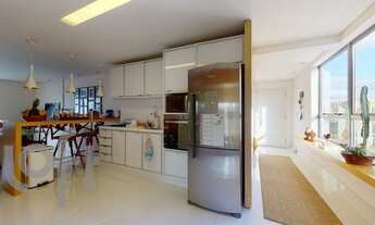 Imagem 6: Apt 180 m², andar alto, amplo living integrado a cozinha com móveis planejados, sala de j