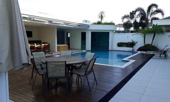 Imagem 2: Excelente casa tríplex finamente mobiliada com 5 suítes, cinema, piscina com cascata e cin