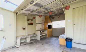 Imagem 3: 1 suíte, cozinha americana, sala em 2 ambiente, área de serviço e 1 vaga de garagem