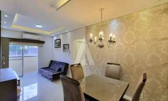 Imagem 3: Apartamento mobiliado com 2 quartos, cozinha com armários, sacada com churrasqueira e 1 va