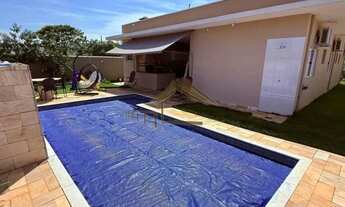 Imagem 2: Linda casa em condomínio na cidade de Porangaba SP, contendo 3 dormitórios e piscina