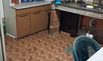 Imagem: Casa no centro da figueira