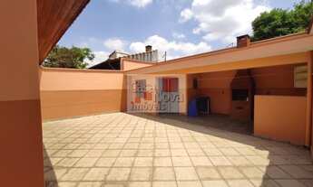 Imagem 6: Lindo sobrado com três dormitórios com duas salas, cozinha e quatro vagas de carro