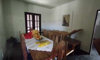 Imagem 4: Casa com piscina e campo de areia