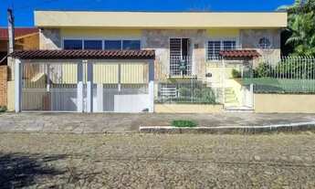 Imagem: Casa térrea com 4 dormitórios no bairro