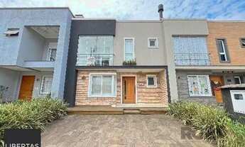 Imagem 2: Casa Condominio em Porto Alegre, no bairro Hípica, com 3 dormitório(s), e 3 banh