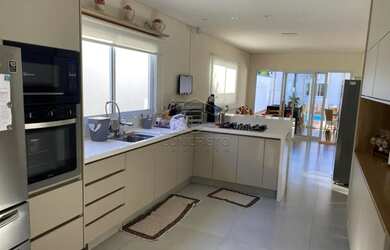 Imagem 4: LINDA CASA DE ALTO PADRÃO COM 5 SUITES