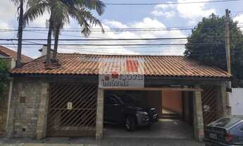 Imagem 2: Lindo sobrado com três dormitórios com duas salas, cozinha e quatro vagas de carro