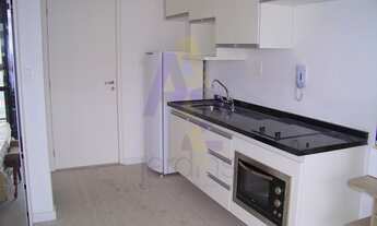 Imagem 2: Studio em ótimo estado. Mobiliado com cozinha equipada e ar condicionado. Com varanda fech