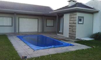 Imagem 2: Casa para venda tem 250 metros quadrados com 4 quartos em Centro - Capão da Canoa - RS