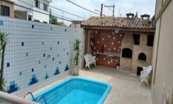 Imagem: Casa de condomínio com piscina, 3 dormitórios