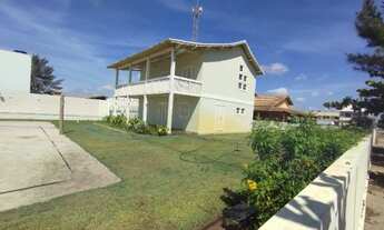 Imagem 5: Casa com piscina e campo de areia