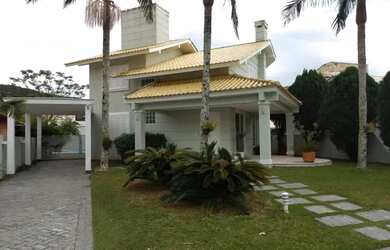 Imagem 2: Casa para aluguel e venda com 285 metros quadrados com 4 quartos.