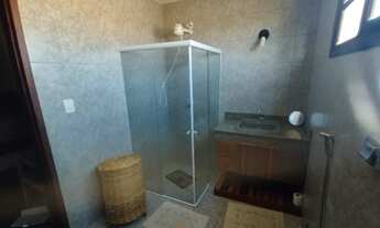 Imagem 6: Casa com piscina e campo de areia