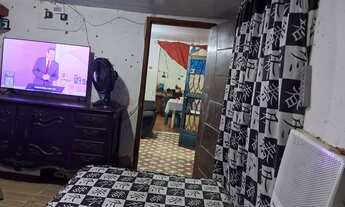 Imagem 6: Casa no centro da figueira