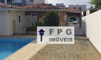 Imagem: Casa com 3 quartos e área gourmet com piscina