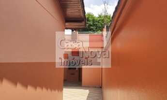 Imagem 5: Lindo sobrado com três dormitórios com duas salas, cozinha e quatro vagas de carro