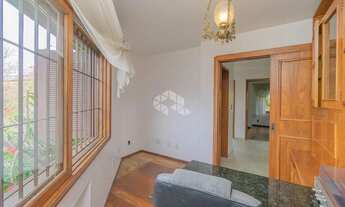 Imagem 7: Casa com 322m², 3 quartos, 3 suítes, 4 vagas, no bairro Três Figueiras em Porto Alegre