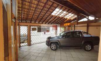 Imagem 3: Lindo sobrado com três dormitórios com duas salas, cozinha e quatro vagas de carro