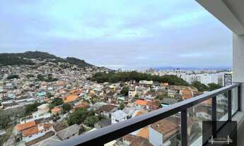 Imagem 2: Apartamento na Agronômica andar alto com vista parcial do Mar