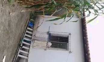 Imagem 6: Casa em rua pública