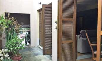 Imagem 5: Casa de 270m² - 3 dormitórios, 1 suíte, churrasqueira, pátio e 3 vagas de garagem