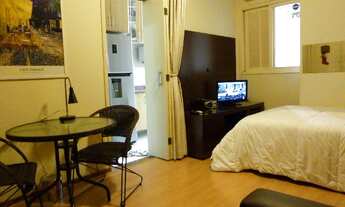 Imagem 2: Sala living requintado e aconchegante na praia. Excelente localização