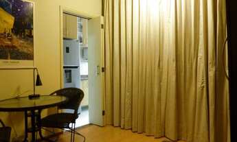 Imagem 3: Sala living requintado e aconchegante na praia. Excelente localização