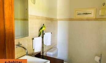 Imagem 2: Jequiti Residence no Guarujá. Casa pé na areia, frente ao mar