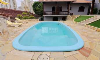 Imagem 7: Ampla casa de alto padrão mobiliada com área de festas e piscina no bairro Vila Nova!