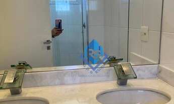 Imagem 2: Apartamento com 3 dormitórios para alugar, 128 m² por R$ 5.079,00/mês - Centro - Santo And