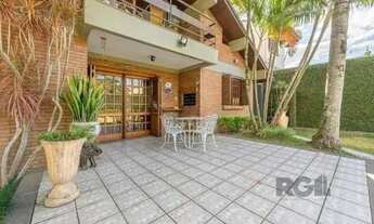 Imagem 5: Casa em Porto Alegre, no bairro Ipanema, com 3 dormitório(s), e 3 banheiros, à v