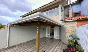 Imagem 2: Duplex em ótima localização - 02 dormitórios, 02 banheiros, sala com lareira