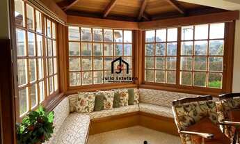 Imagem 5: Casa com 5 dormitórios sendo 3 suítes no bairro Capivari em Campos do Jordão