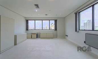 Imagem: Sala comercial e uma vaga de garagem no