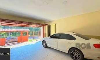 Imagem 5: Casa em Porto Alegre, no bairro Nonoai, com 4 dormitório(s), à venda