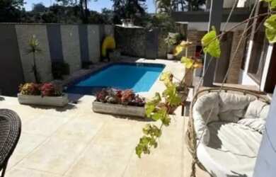 Imagem 3: Casa Contemporânea com 6 Suítes no Morada dos Pássaros Alto Padrão