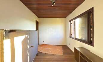 Imagem 5: Casa muito bem localizada com terreno extenso, arborizado com vista maravilhosa