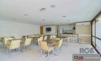 Imagem 3: Vende apartamento desocupado, andar alto, mobiliado, living de dois ambientes, no Passo da