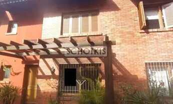 Imagem 2: IMOBILIÁRIA SCHOTKIS ALUGA EXCELENTE CASA RESIDENCIAL DE TRÊS PAVIMENTOS COM 04 DORMITÓRIO