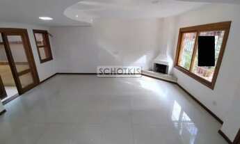 Imagem 5: IMOBILIÁRIA SCHOTKIS ALUGA EXCELENTE CASA RESIDENCIAL DE TRÊS PAVIMENTOS COM 04 DORMITÓRIO