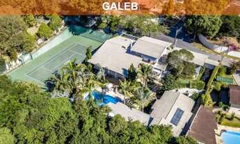 Imagem 1: MANSÃO NO CONDOMÍNIO FLAMBOYANT COM LAZER COMPLETO