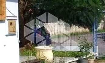 Imagem 5: Casa Localizada Em Rua Asfaltada