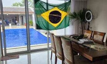 Imagem 2: Bela casa com três suítes, piscina e área gourmet à venda no Condomínio portal da Vila Ric