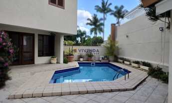 Imagem 5: ALPHAVILLE RESIDENCIAL 05 APRESENTE ESTE LINDO SOBRADO COM 542 M² DE AT E 4 SUITES, 3 VAGA