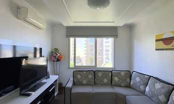 Imagem 2: Apartamento mobiliado de 71m², com 2 dormitórios, sendo 1 suíte e vaga no Centro