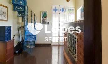 Imagem 2: Casa térrea com 500m2 de construção e terreno de 1.000m2, 4 suítes, varanda gourmet, próxi