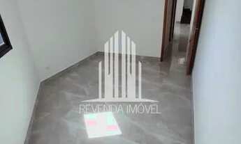 Imagem 4: Apartamento sem condomínio com 2 quintais, 2 dormitórios e 1 vaga de garagem na Vila Helen