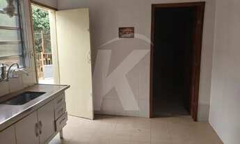 Imagem 3: Casa com 2 quartos, sala, cozinha, banheiro, área de serviço, quintal