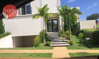 Imagem 3: Sobrado para vender no condomínio Alphaville com 3 suítes, pronto para morar